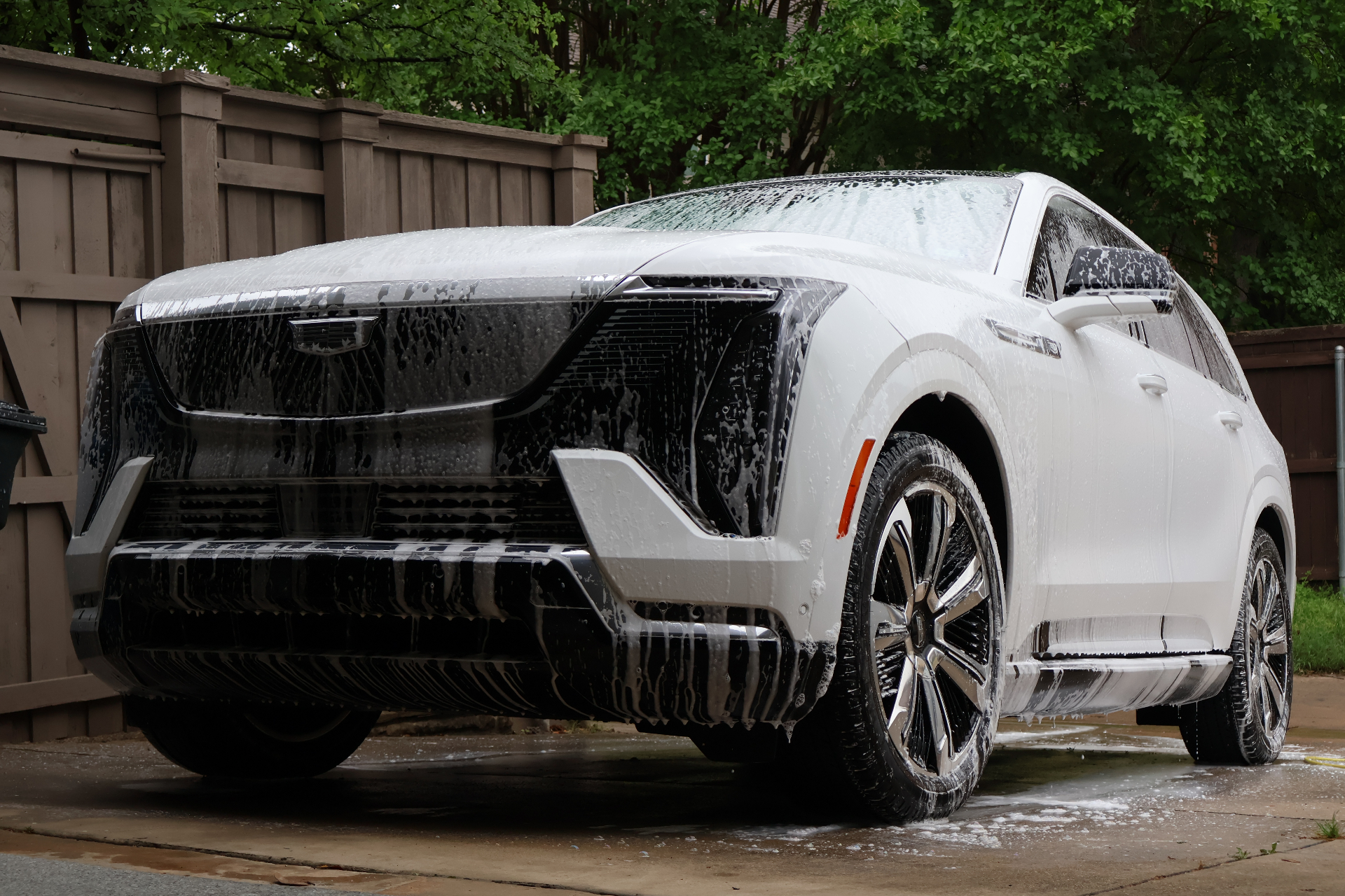 Cadillac Escalade IQ covered in foam during a Boulos Detail wash